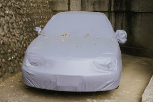 sedan with weatherproof cover